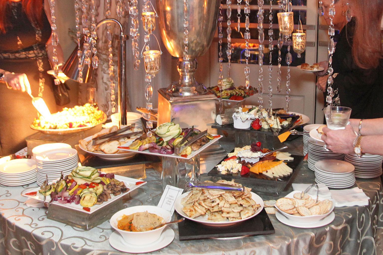 A buffet table with a lot of food on it