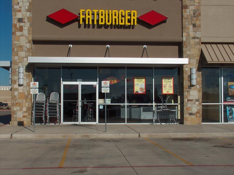 A fatburger restaurant with a lot of windows