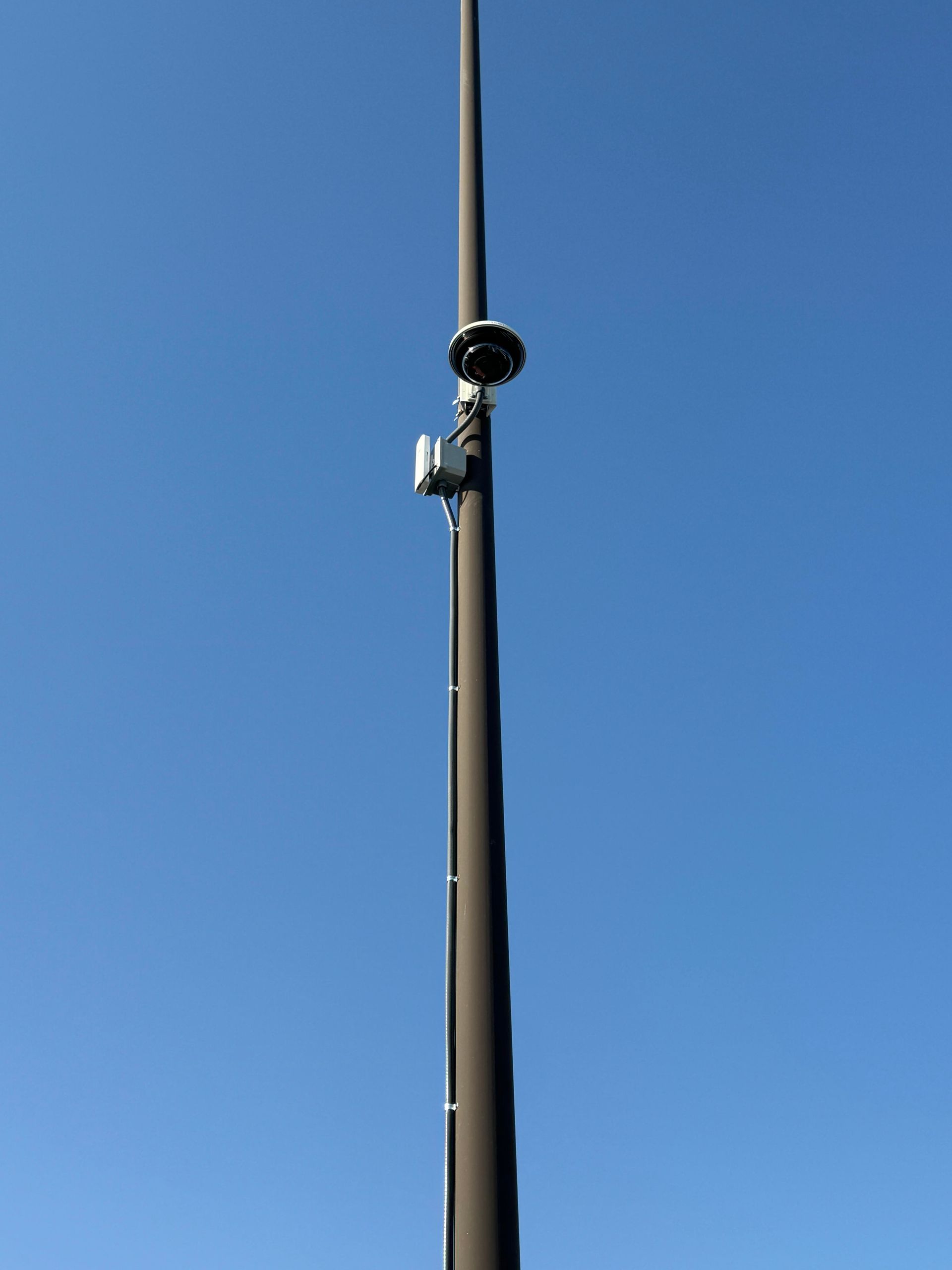 3Cs Audio-Visuals LLC | Surveillance camera mounted on pole with wireless module for motion detection & remote monitoring
