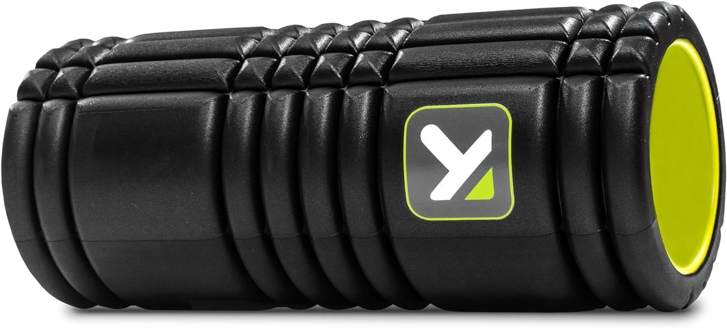 A black and yellow foam roller with a y logo on it.