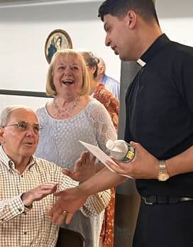 Fr. Carlos with the D'Antonas