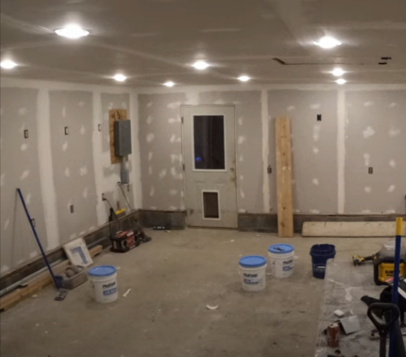 Garage drywall is installed and mudded