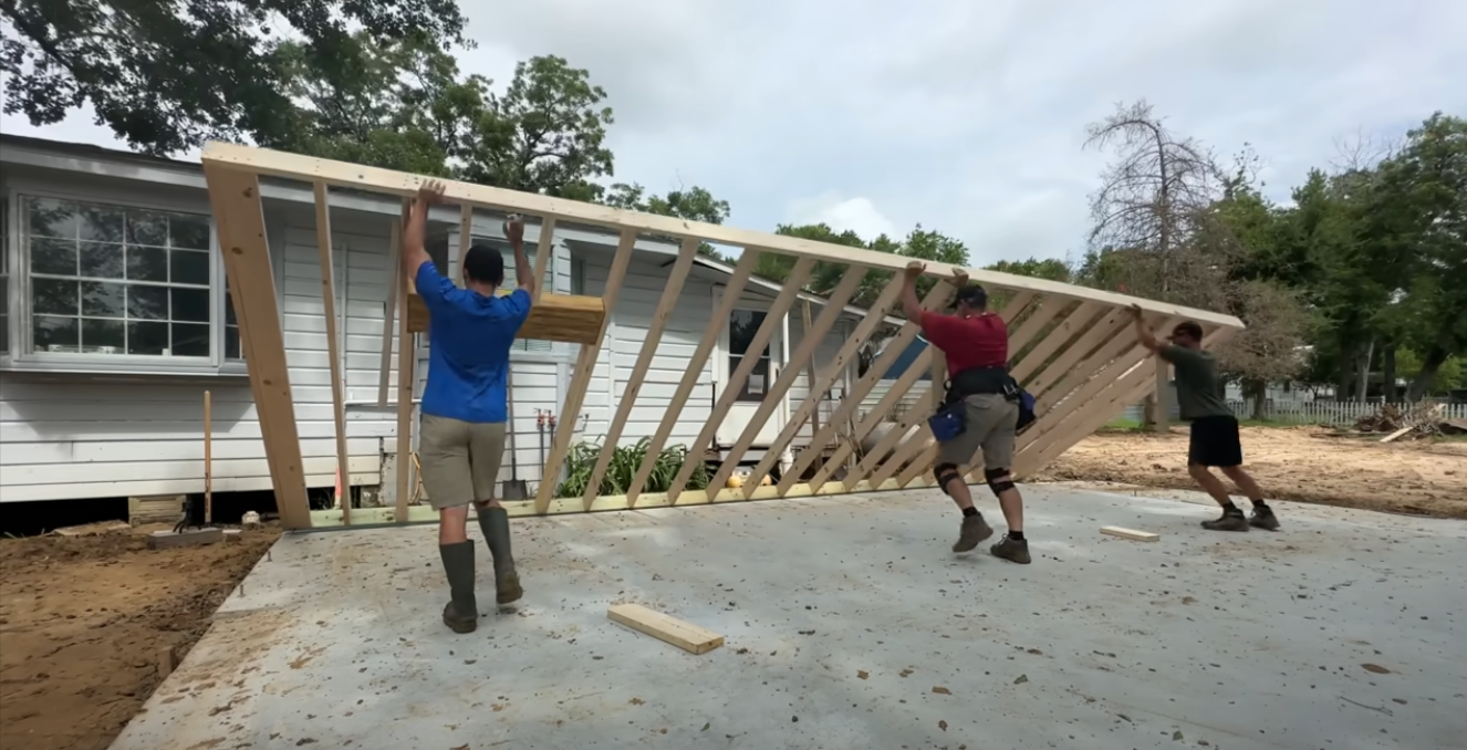 Garage wall frames being raised
