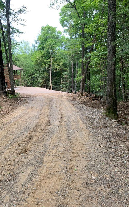 Trees Beside a Driveway — Ogema, WI — Jeff Simek Construction Co Inc