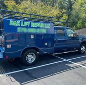 Black and white illustration of a forklift, with text 