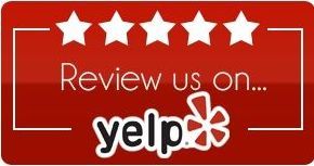 A red sign that says `` review us on yelp ''