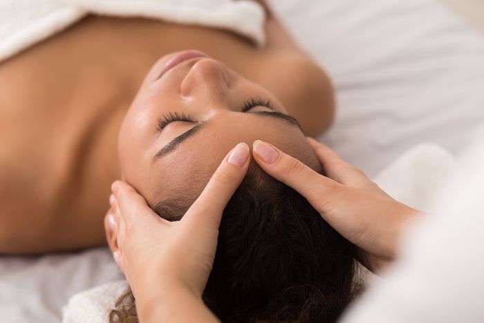 Woman Enjoying Facial Massage — Hudson, NY — Serenity Wellness Medical Spa