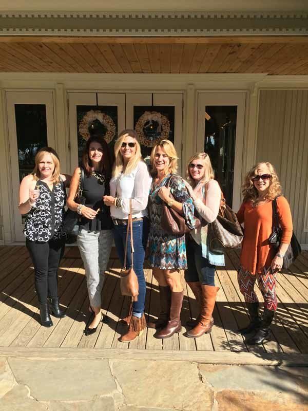 group of women together on porch