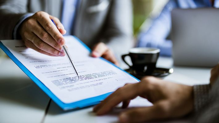Signing A Document — Cleveland, GA — Doug Freeman Insurance Agency
