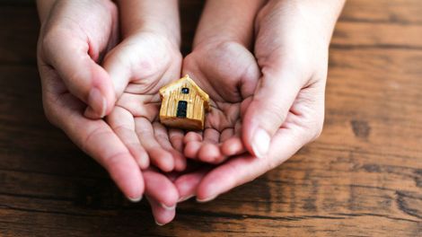 Hands And A Miniature House — Cleveland, GA — Doug Freeman Insurance Agency