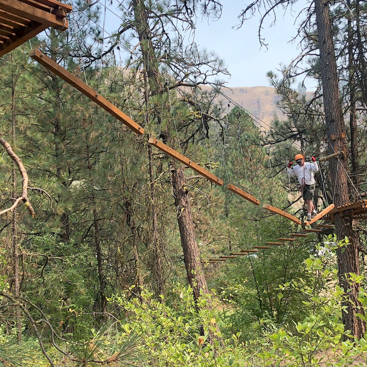 High ropes challenge course in forest near Boise Idaho