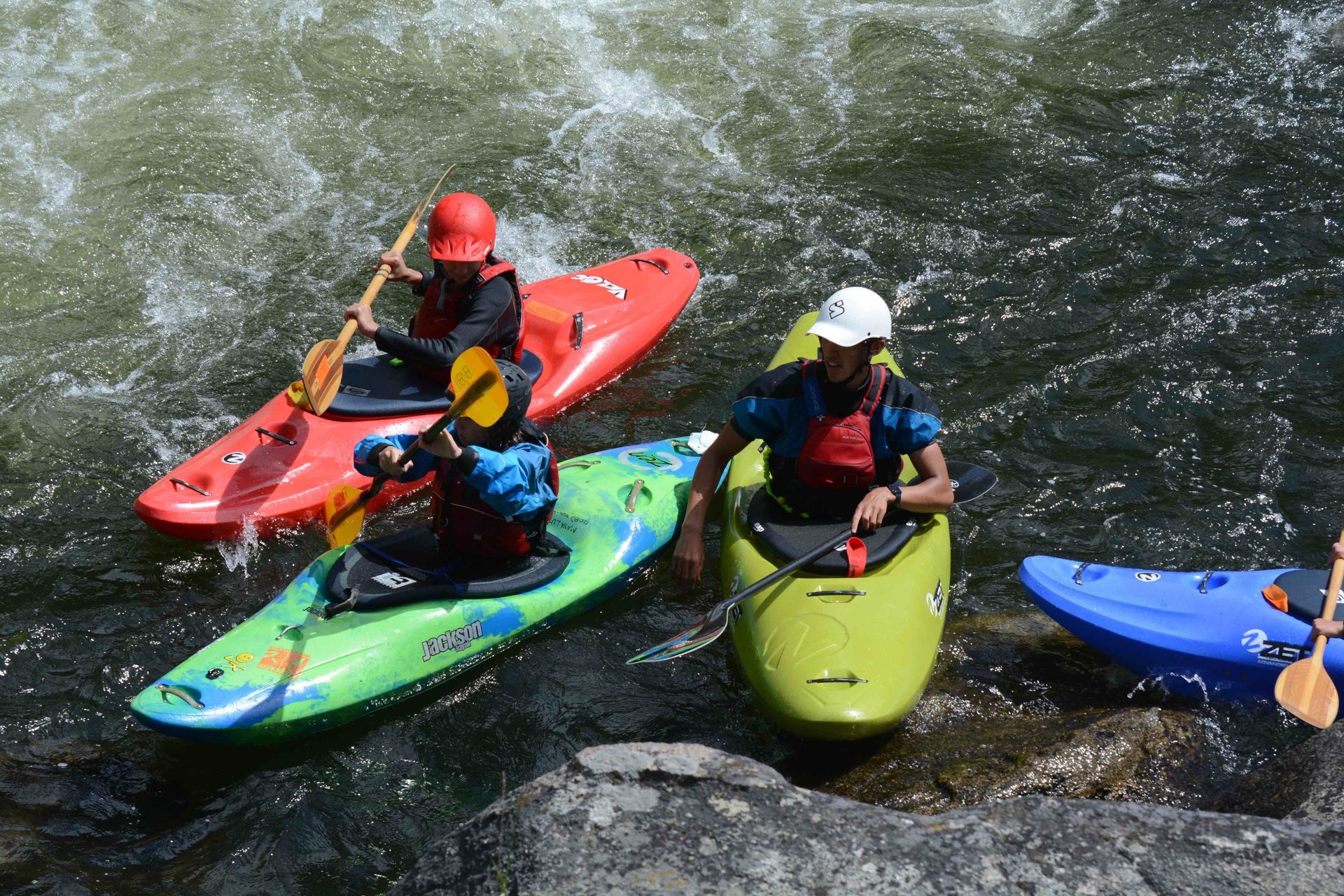 Three kayakers in Payette River