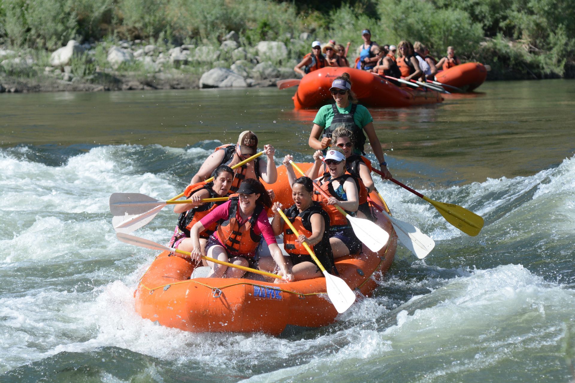 Guided rafting trip in whitewater rapids