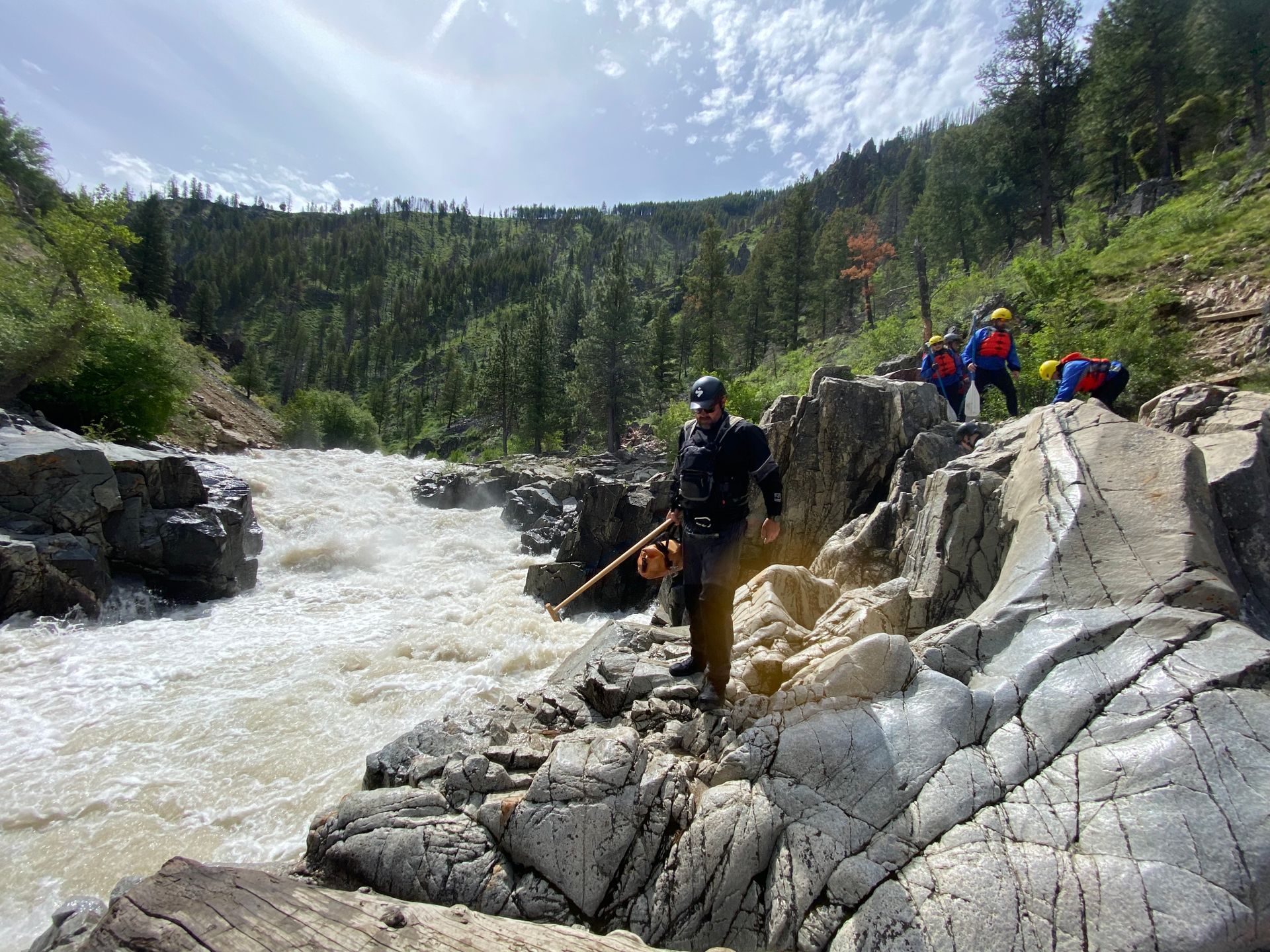 Raft guides portaging Big Falls rapid on the South Fork of the Payette in Boise National Forest.