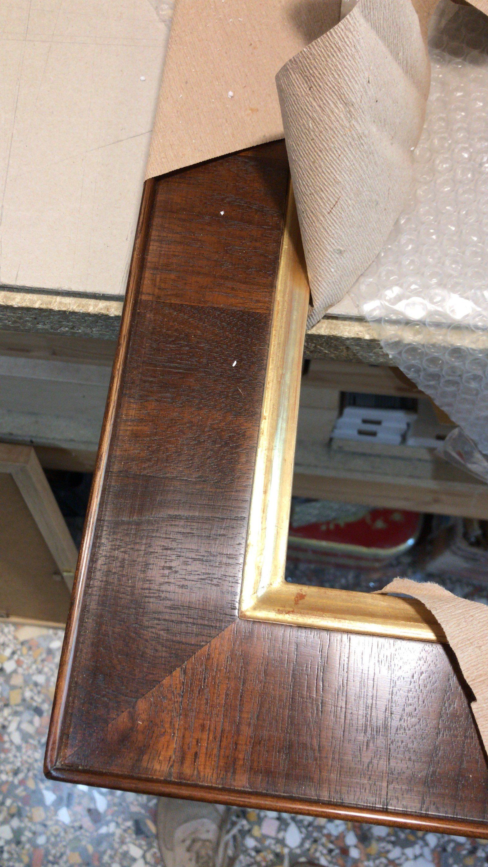 restauri del negozio di cornici a Milano