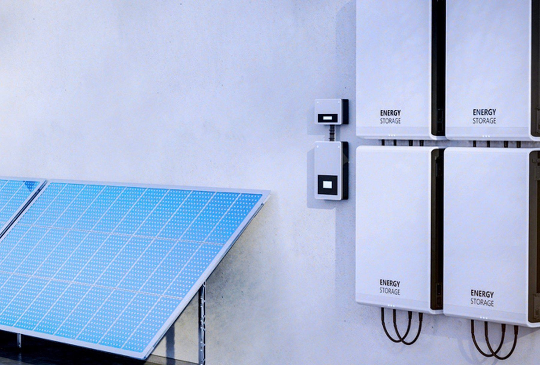 A worker installs solar panels on a roof, under a blue sky.