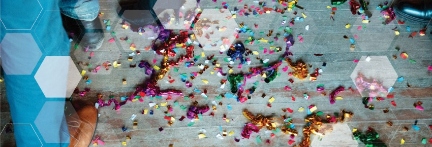 There is a lot of confetti on the floor.