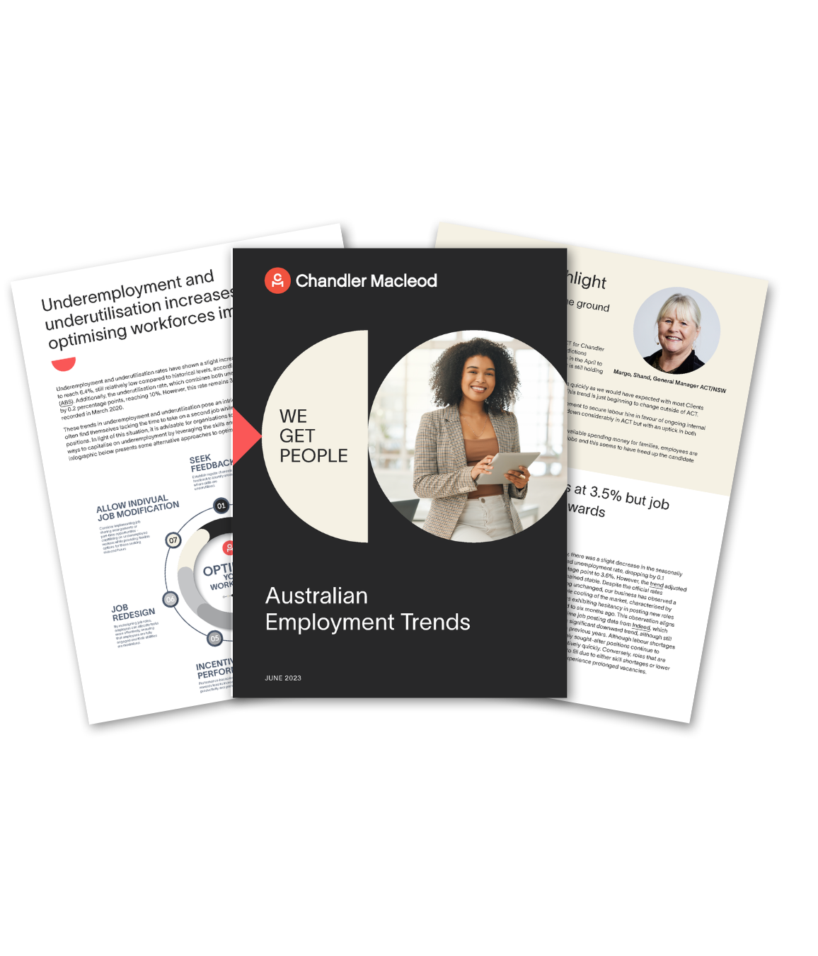 A woman is standing in front of a stack of papers.