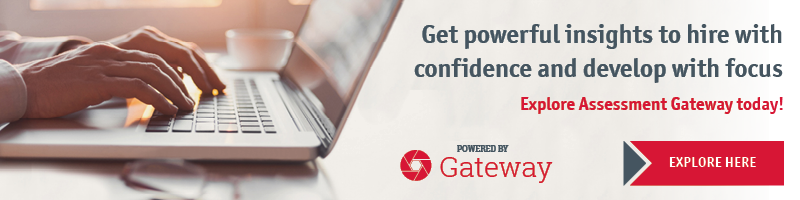 A person is typing on a laptop computer.