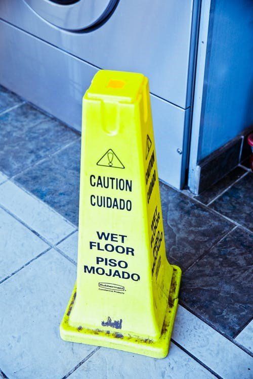 A wet floor caution sign