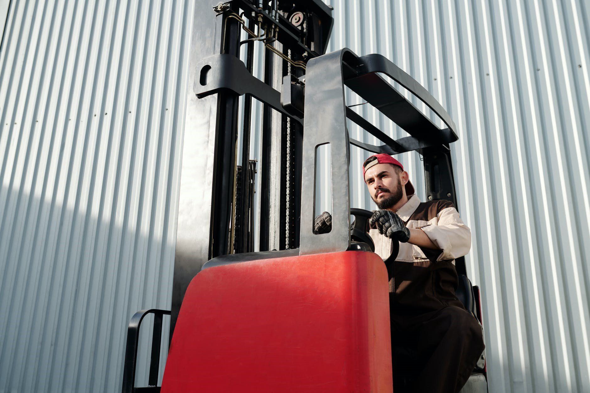 Man sitting in a forklift during a training course.