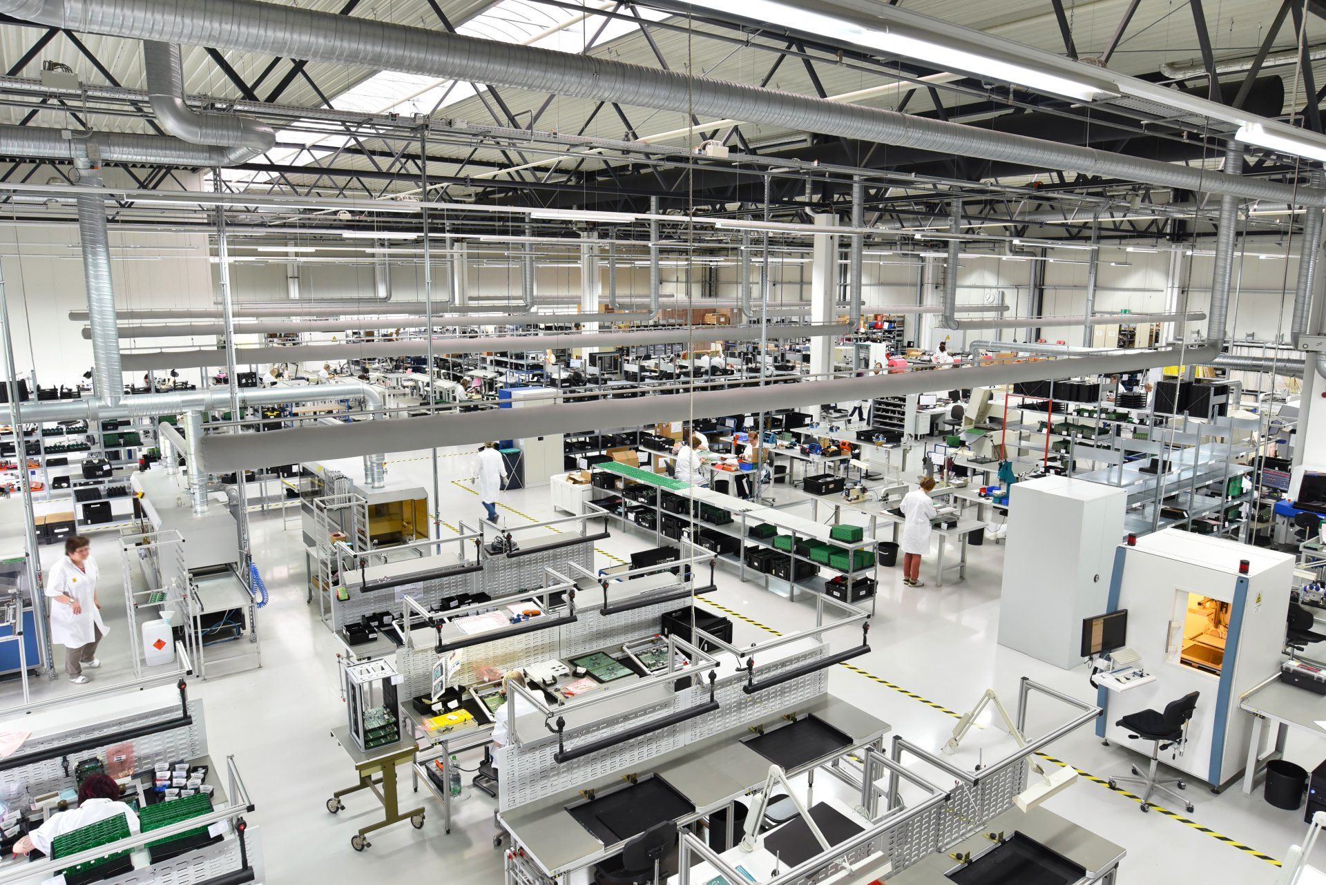 A manufacturing plant is bustling with work