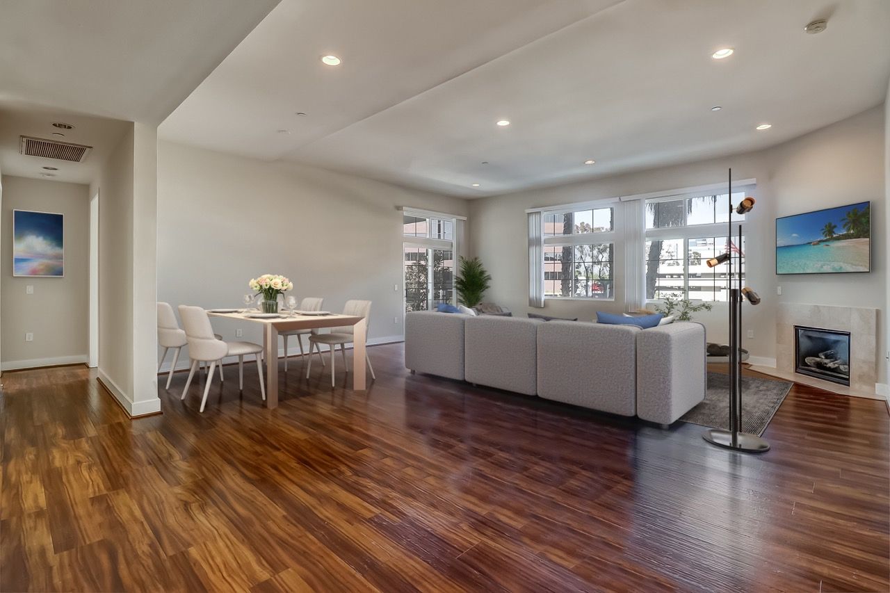 Axis furnished apartment dining and living room from back