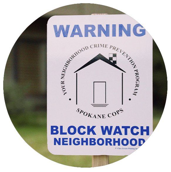 Warning sign in a yard that says 