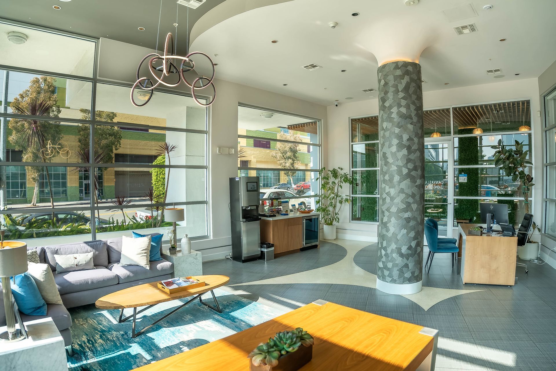 A living room with a couch , coffee table , and other furniture.