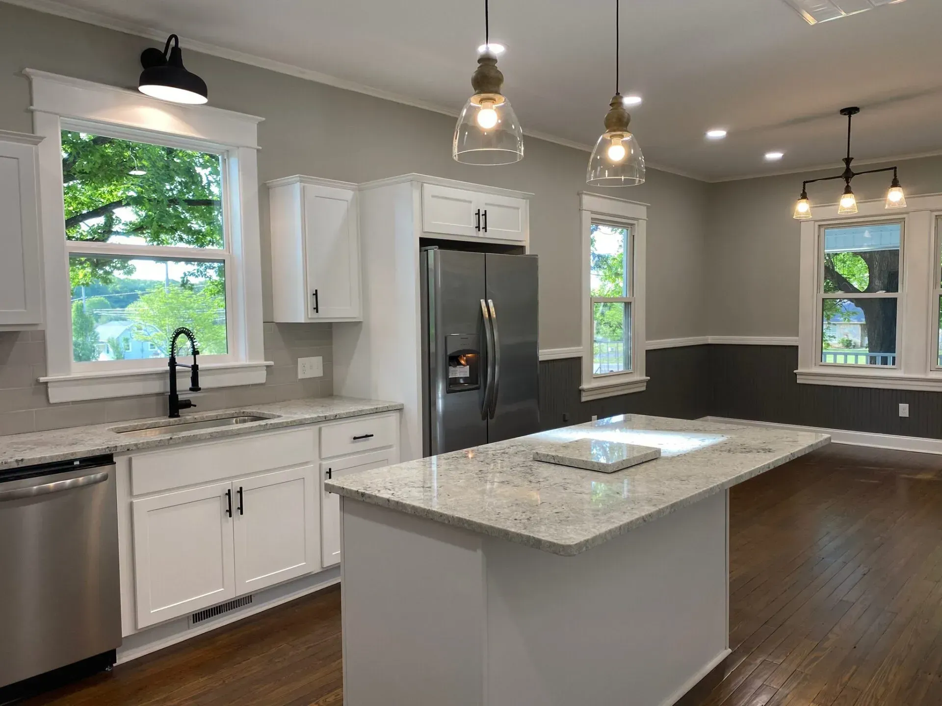 There is a large island in the middle of the kitchen.
