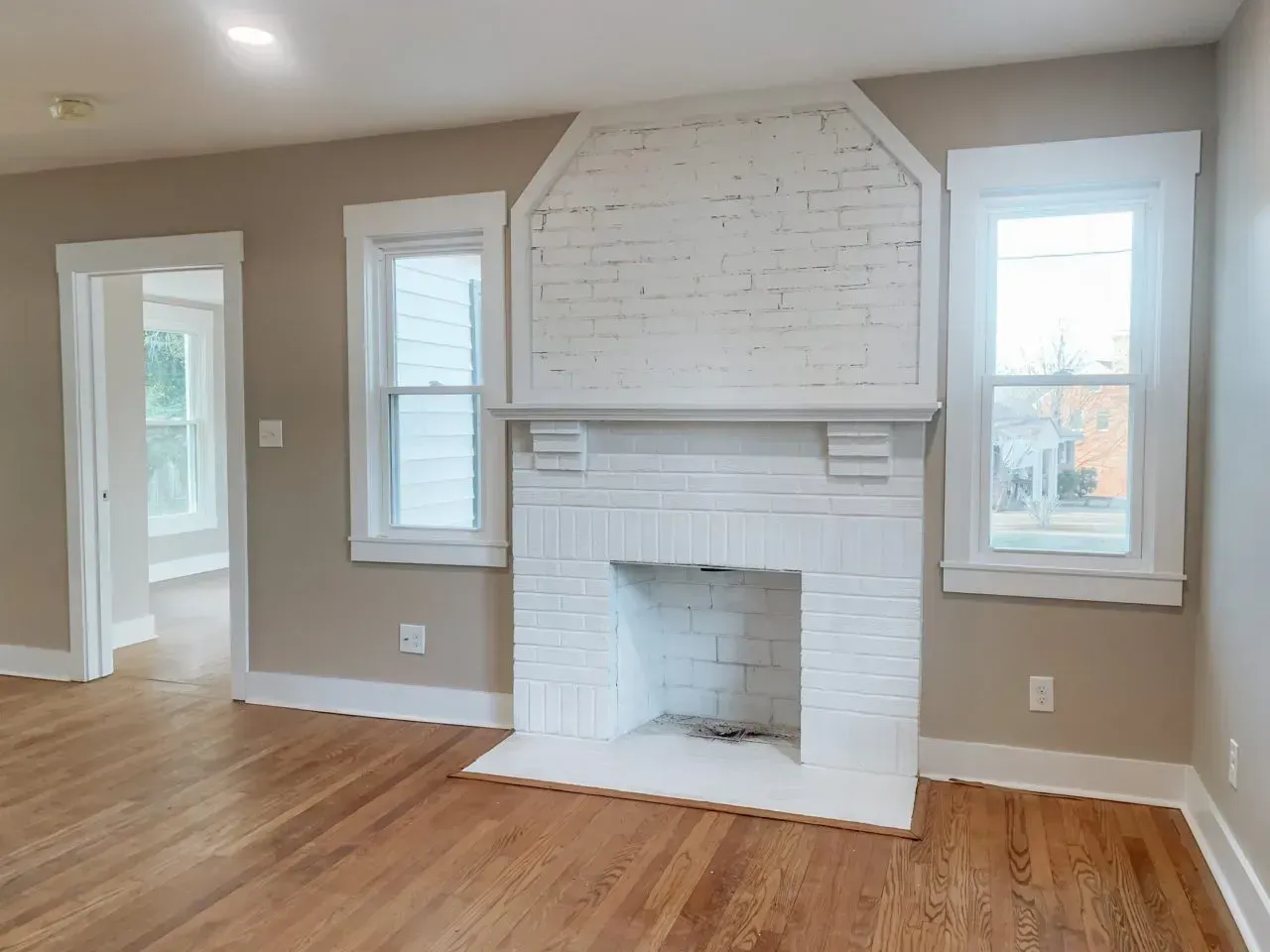 There is a fireplace in the middle of the room.