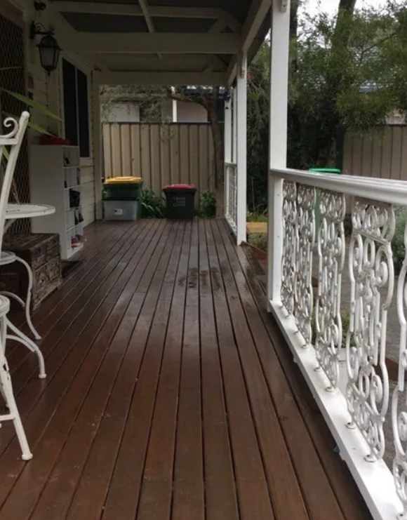 Wooden Porch With Ornate White Railing — Alcando Renovations and Maintenance In Forster, NSW