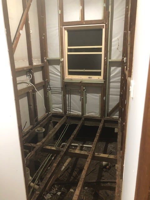 Bathroom Under Construction, Showing Exposed Studs — Alcando Renovations and Maintenance In Harrington, NSW