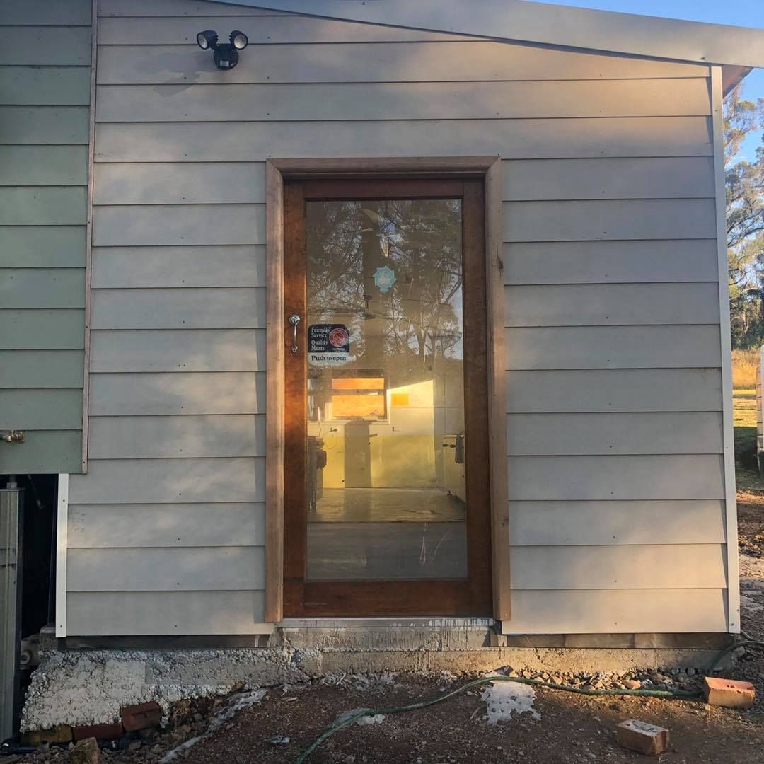 Exterior View of a Building With a Glass Door — Alcando Renovations and Maintenance In Wingham, NSW