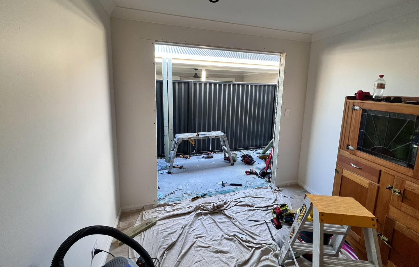 Interior Room With Doorway Opening to Backyard — Alcando Renovations and Maintenance In Bobin, NSW