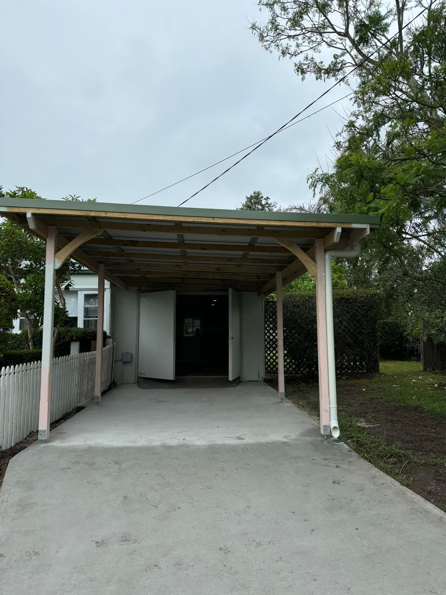 Driveway With a Wooden Carport Leading to a Building — Alcando Renovations and Maintenance In Harrington, NSW