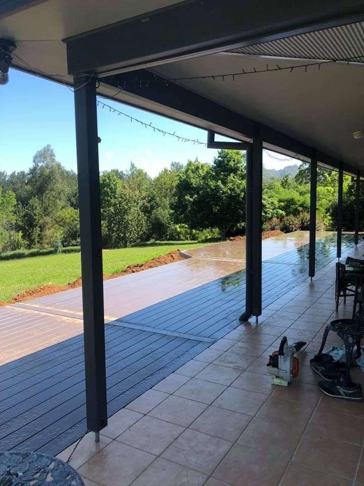 Covered Patio With Deck and Tiled Floor Overlooking a Green Lawn — Alcando Renovations and Maintenance In Taree, NSW