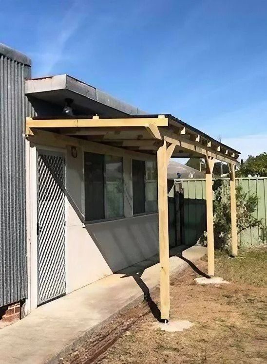 Wooden Pergola Extending From a Building's Entrance — Alcando Renovations and Maintenance In Bobin, NSW