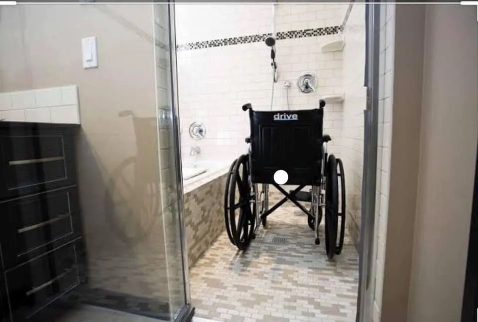 Wheelchair Inside Accessible Shower With Built-in Bench — Alcando Renovations and Maintenance In Wingham, NSW