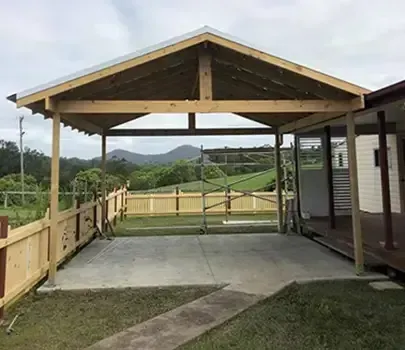 Wooden Carport With Concrete Pad, Open to a Grassy Yard — Alcando Renovations and Maintenance In Bobin, NSW