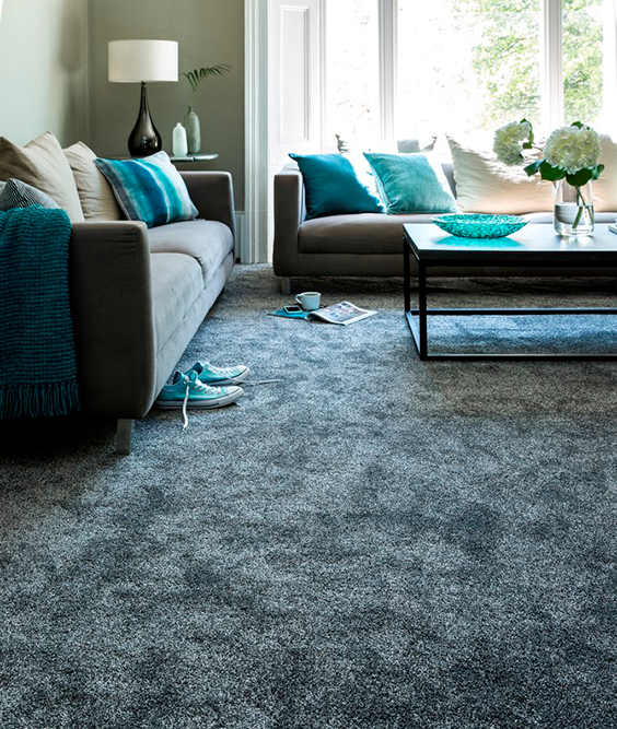 A living room with a couch and a coffee table