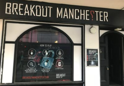 The outside of a restaurant called breakout manchester