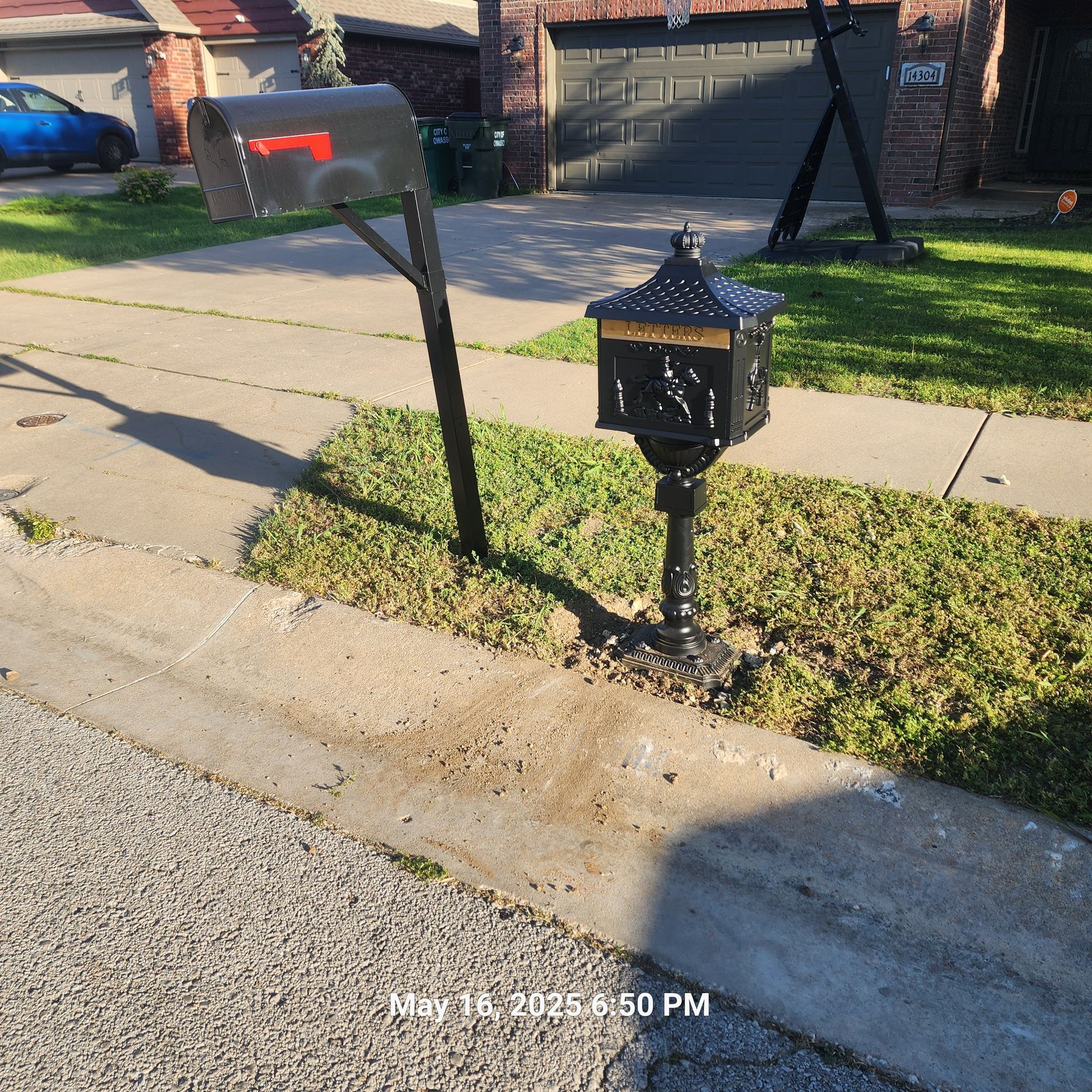 A picture of a mailbox taken on may 18 at 6:50 pm