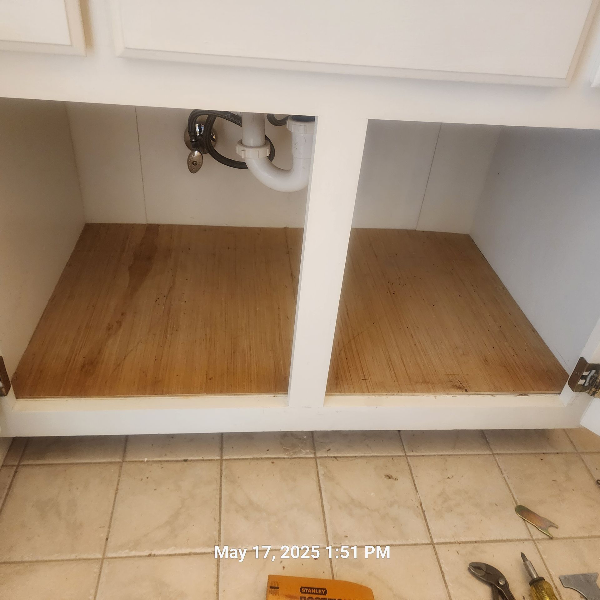 A picture of a bathroom sink taken on may 17th at 1:51 pm