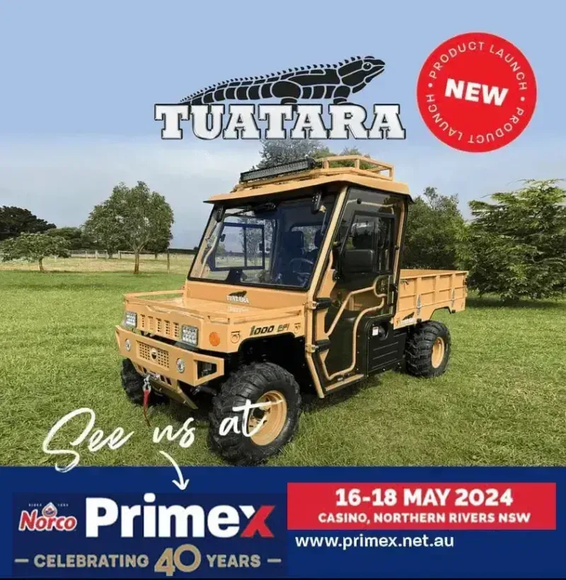 A tan Tuatara UTV parked in a field, advertising a new product launch at the Norco Primex expo on May 16-18, 2024.