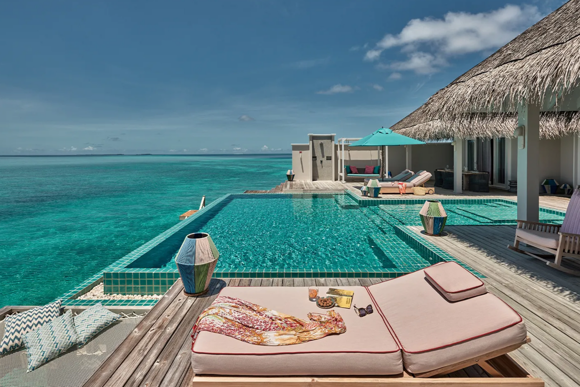 There is a large swimming pool in the middle of the ocean.