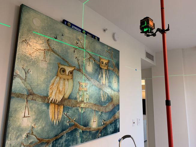 Art hanging and wall mounting services Key Biscayne