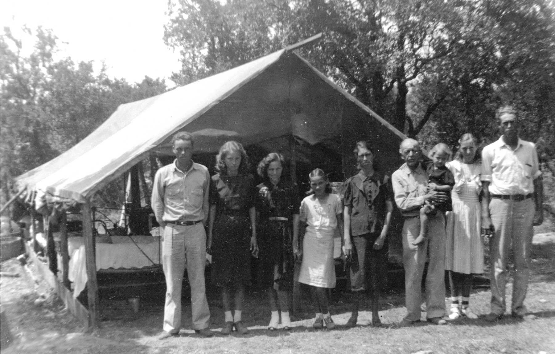 Gumberts and Maplesin a tent near Lake Victor, Burnet County