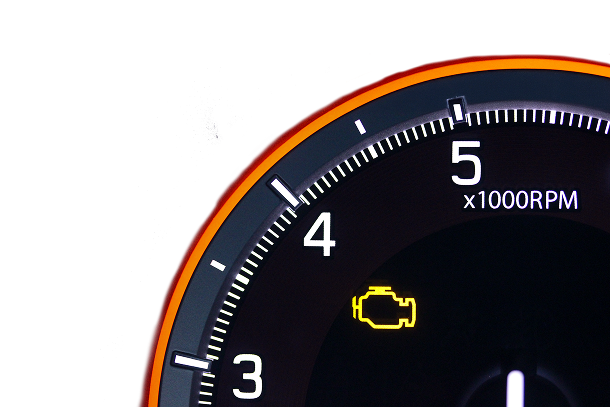 Dashboard showing the check engine light illuminated, with the needle near 4000 RPM. | Arizona Engine Rebuilding