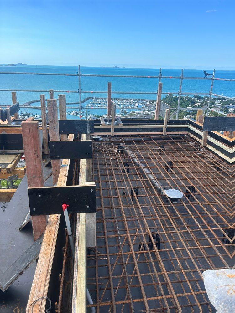 A Construction Site With A View Of The Ocean — Rock Plumbing & Gasfitting In Cannonvale, QLD